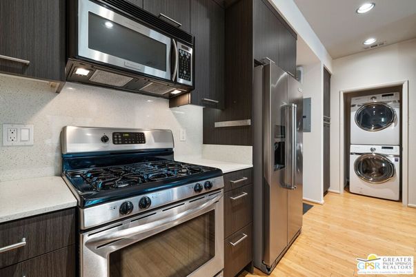 Interior, Kitchen, Recessed Lighting, Stainless Steel Appliances, Utility Closets, Washer, Wood Texture Flooring