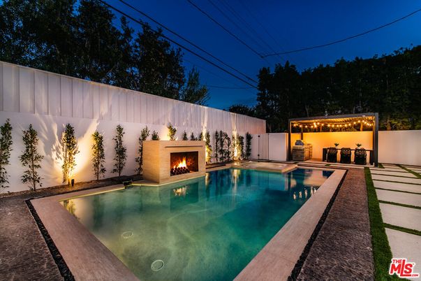 Exterior, Fireplace, Pool