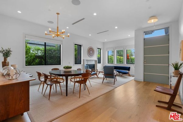 Dining room, Fireplace, Interior, Living room, Pendant Lights, Recessed Lighting, Wood Texture Flooring