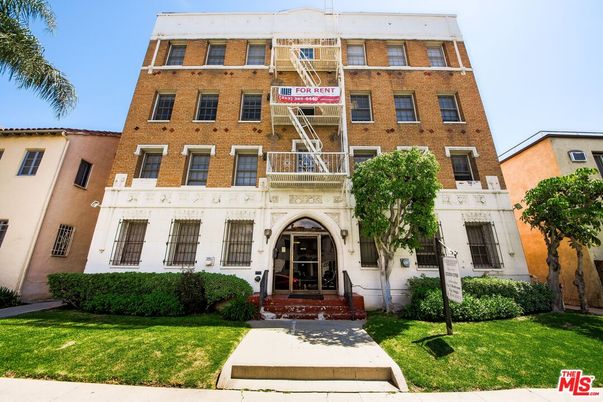 Exterior, Facade, Brick Facade, Condo Building