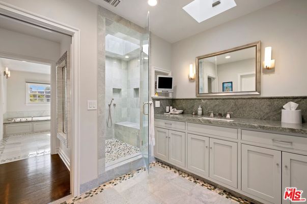 Bathroom, Dual Sink Vanities, Glass Shower, Interior, Recessed Lighting, Wood Texture Flooring