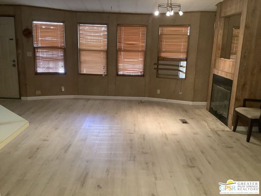 Empty room, Fireplace, Interior, Pendant Lights, Wood Texture Flooring