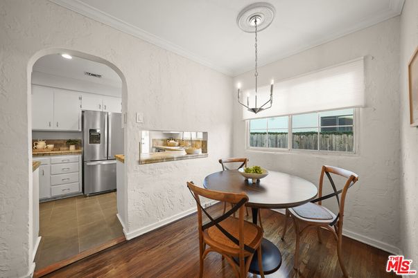 Dining room, Interior, Kitchen, Pendant Lights, Recessed Lighting, Stainless Steel Appliances, Wood Texture Flooring