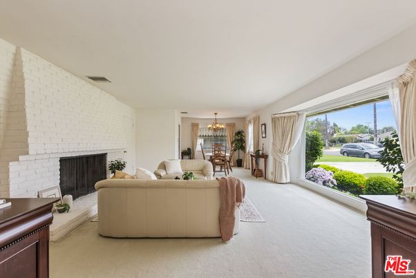 Chandelier, Dining room, Fireplace, Interior, Living room, Stone Walls