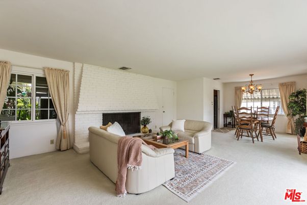 Chandelier, Dining room, Fireplace, Interior, Living room, Stone Walls