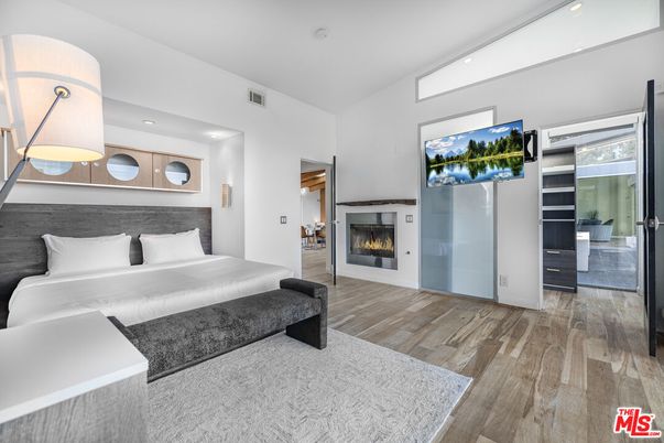 Bedroom, Fireplace, Interior, Recessed Lighting, Wood Texture Flooring