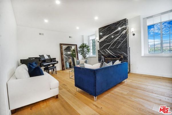 Fireplace, Interior, Living room, Marble Walls, Piano, Recessed Lighting, Wood Texture Flooring