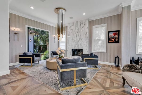 Fireplace, Interior, Living room, Marble Walls, Pendant Lights, Recessed Lighting, Wood Texture Flooring