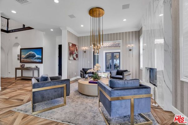 Fireplace, Interior, Living room, Marble Walls, Pendant Lights, Recessed Lighting, Wood Texture Flooring