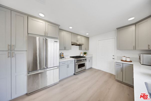 Interior, Kitchen, Recessed Lighting, Stainless Steel Appliances, Wood Texture Flooring