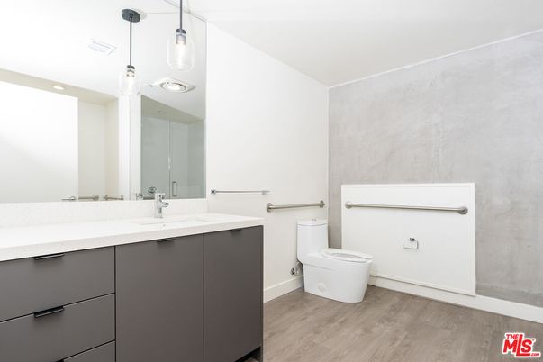 Bathroom, Dual Sink Vanities, Interior, Pendant Lights, Wood Texture Flooring