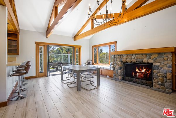 Chandelier, Dining room, Fireplace, Interior, Wooden Beams, Wood Texture Flooring