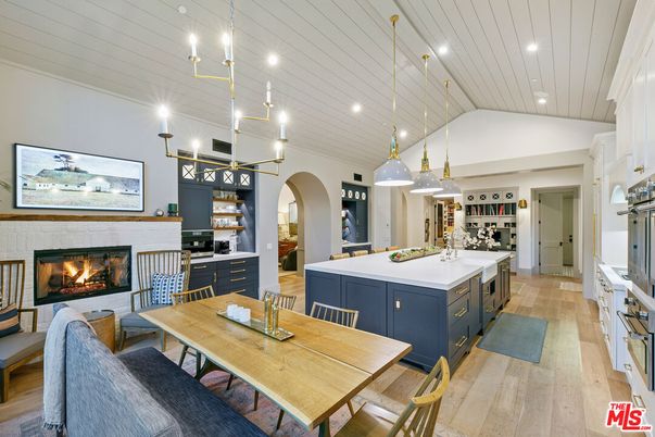 Dining room, Fireplace, Interior, Kitchen, Pendant Lights, Recessed Lighting, Wood Texture Flooring