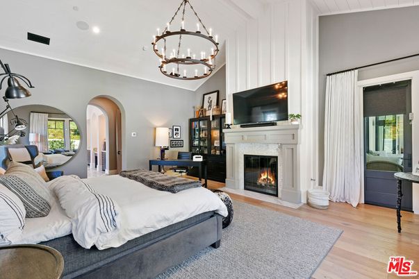 Bedroom, Chandelier, Fireplace, Interior, Pendant Lights, Recessed Lighting, Wood Texture Flooring
