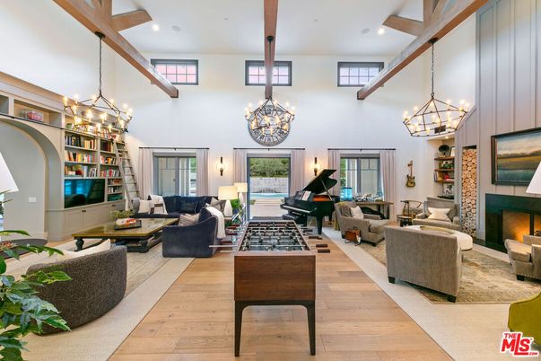 Chandelier, Fireplace, Interior, Living room, Pendant Lights, Piano, Recessed Lighting, Wooden Beams, Wood Texture Flooring