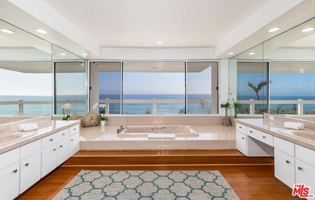 Bathroom, Dual Sink Vanities, Glass Shower, Interior, Recessed Lighting, Water, Wood Texture Flooring