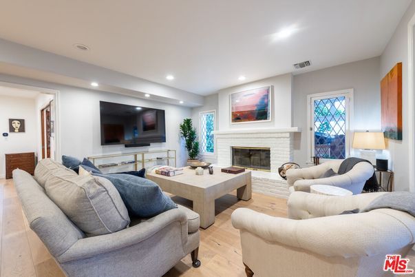 Fireplace, Interior, Living room, Recessed Lighting, Wood Texture Flooring