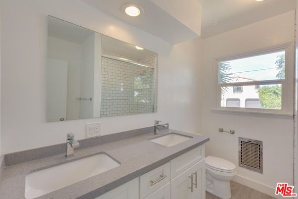 Bathroom, Dual Sink Vanities, Interior, Recessed Lighting, Wood Texture Flooring