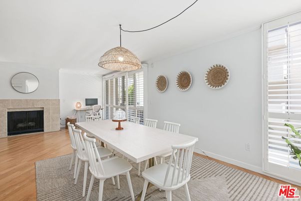 Dining room, Fireplace, Interior, Pendant Lights, Wood Texture Flooring
