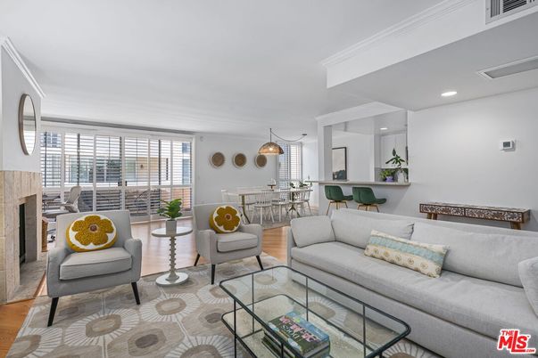 Dining room, Fireplace, Interior, Living room, Pendant Lights, Recessed Lighting, Wood Texture Flooring