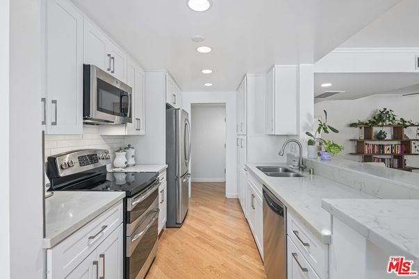 Interior, Kitchen, Recessed Lighting, Stainless Steel Appliances, Wood Texture Flooring