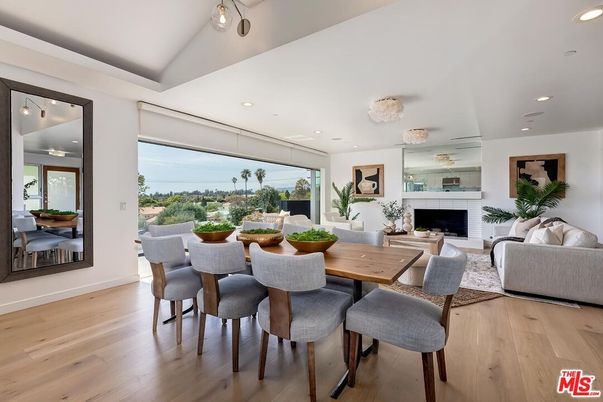 Dining room, Fireplace, Interior, Living room, Recessed Lighting, Wood Texture Flooring