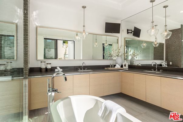 Bathroom, Dual Sink Vanities, Free Standing Baths, Glass Shower, Interior, Pendant Lights, Wood Texture Flooring