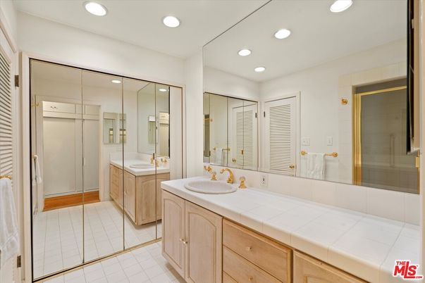 Bathroom, Dual Sink Vanities, Glass Shower, Interior, Recessed Lighting, Tile Countertops