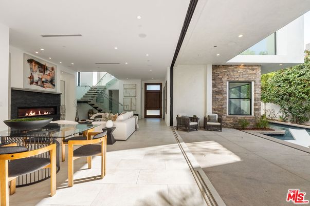 Dining room, Fireplace, Interior, Living room, Pool, Recessed Lighting, Stone Walls