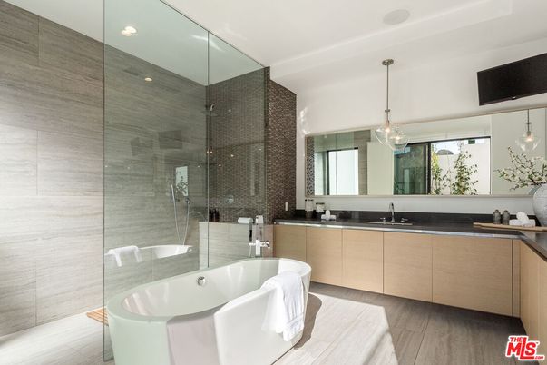 Bathroom, Dual Sink Vanities, Free Standing Baths, Glass Shower, Interior, Pendant Lights, Recessed Lighting, Wood Texture Flooring
