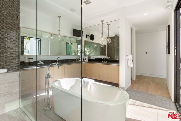 Bathroom, Dual Sink Vanities, Free Standing Baths, Glass Shower, Interior, Pendant Lights, Recessed Lighting, Wood Texture Flooring