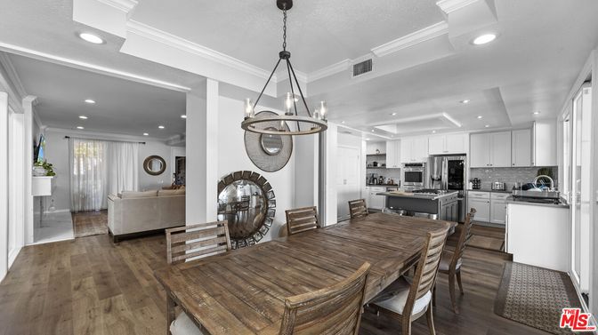 Dining room, Interior, Kitchen, Living room, Pendant Lights, Recessed Lighting, Stainless Steel Appliances, Wood Texture Flooring
