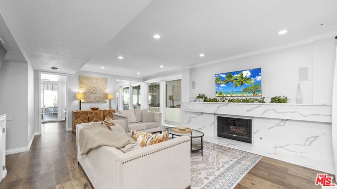 Fireplace, Interior, Living room, Marble Walls, Recessed Lighting, Wood Texture Flooring