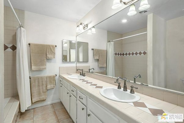 Bathroom, Dual Sink Vanities, Glass Shower, Interior, Recessed Lighting, Tile Countertops