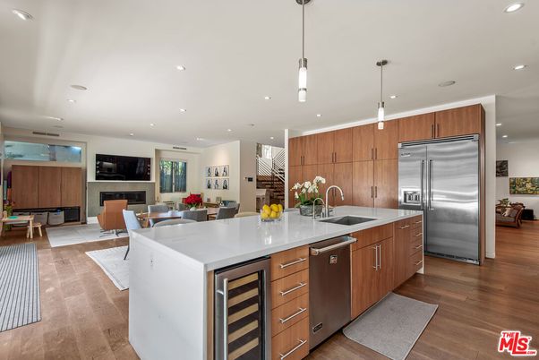 Dining room, Fireplace, Interior, Kitchen, Living room, Pendant Lights, Recessed Lighting, Stainless Steel Appliances, Wood Texture Flooring