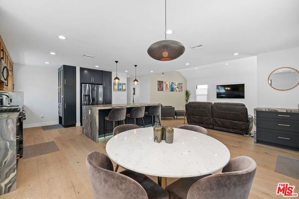 Dining room, Interior, Kitchen, Living room, Pendant Lights, Recessed Lighting, Stainless Steel Appliances, Wood Texture Flooring