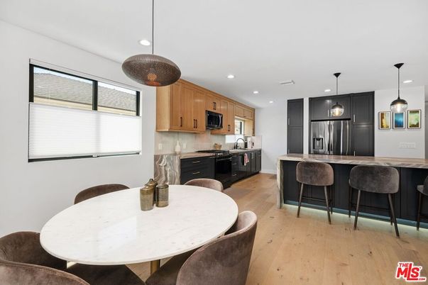 Dining room, Interior, Kitchen, Pendant Lights, Recessed Lighting, Stainless Steel Appliances, Wood Texture Flooring