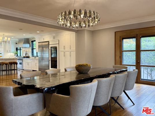 Chandelier, Dining room, Interior, Kitchen, Pendant Lights, Recessed Lighting, Stainless Steel Appliances, Wood Texture Flooring