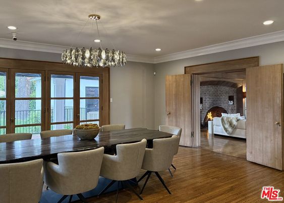 Dining room, Fireplace, Interior, Living room, Pendant Lights, Recessed Lighting, Stone Walls, Wood Texture Flooring