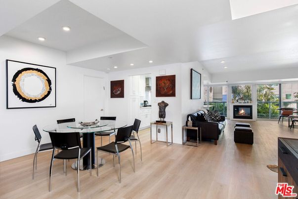 Dining room, Fireplace, Interior, Living room, Recessed Lighting, Wood Texture Flooring