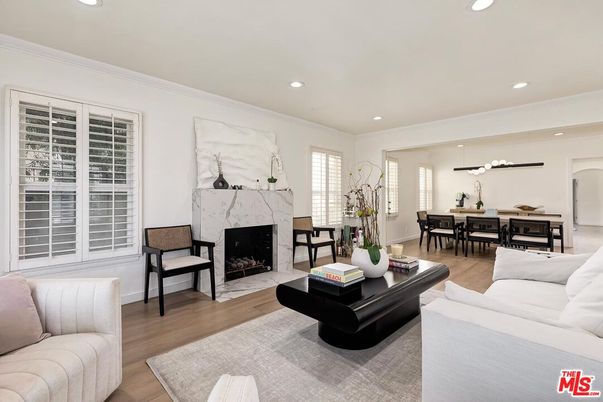 Dining room, Fireplace, Interior, Living room, Marble Walls, Recessed Lighting, Wood Texture Flooring