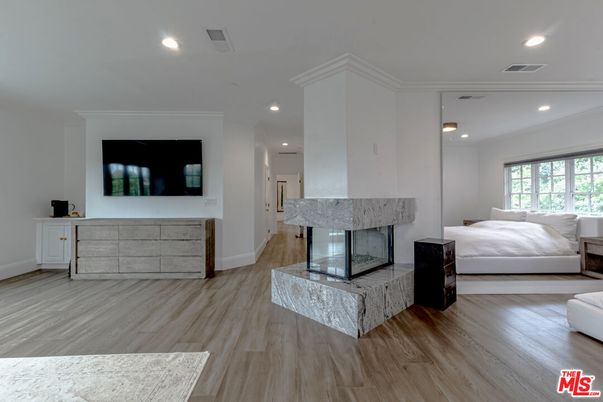 Bedroom, Fireplace, Interior, Recessed Lighting, Wood Texture Flooring