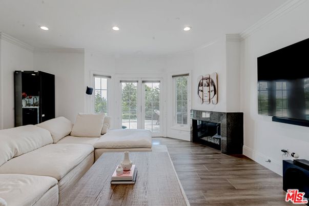 Fireplace, Interior, Living room, Recessed Lighting, Wood Texture Flooring