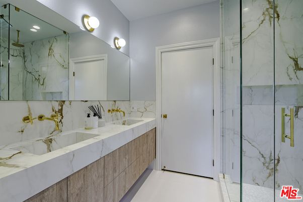 Bathroom, Dual Sink Vanities, Glass Shower, Interior, Marble Walls, Recessed Lighting