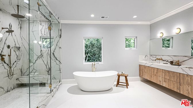 Bathroom, Dual Sink Vanities, Free Standing Baths, Glass Shower, Interior, Marble Walls, Recessed Lighting