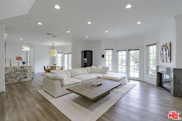 Dining room, Fireplace, Interior, Living room, Pendant Lights, Recessed Lighting, Wood Texture Flooring