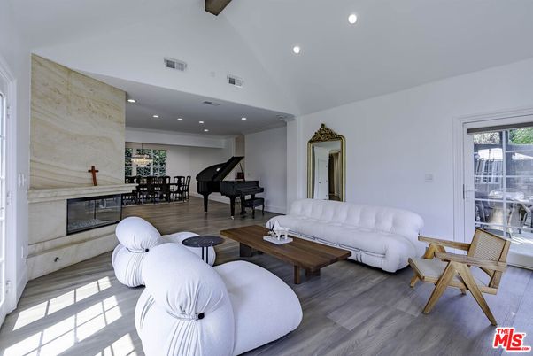 Fireplace, Interior, Living room, Piano, Recessed Lighting, Wood Texture Flooring