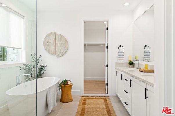 Bathroom, Dual Sink Vanities, Free Standing Baths, Interior, Recessed Lighting, Walk-in Closets, Wood Texture Flooring