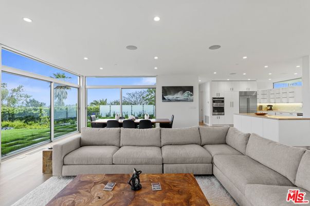Dining room, Interior, Kitchen, Living room, Recessed Lighting, Stainless Steel Appliances, Wood Texture Flooring