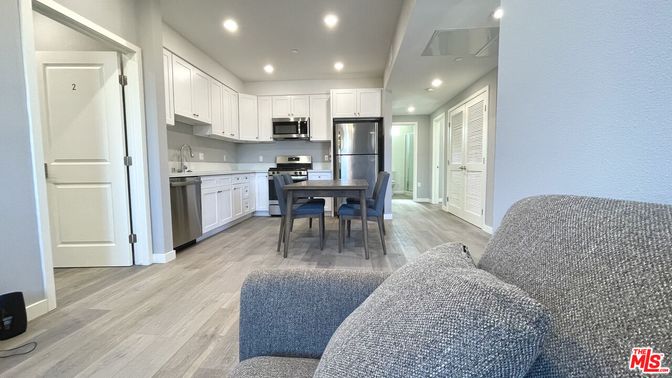 Dining room, Interior, Kitchen, Recessed Lighting, Stainless Steel Appliances, Wood Texture Flooring